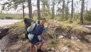 Lee Vue portaging with pack in the BWCA